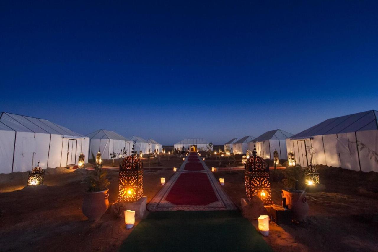 Sahara Majestic Luxury Camp Hotel Merzouga Exterior photo The camp at night