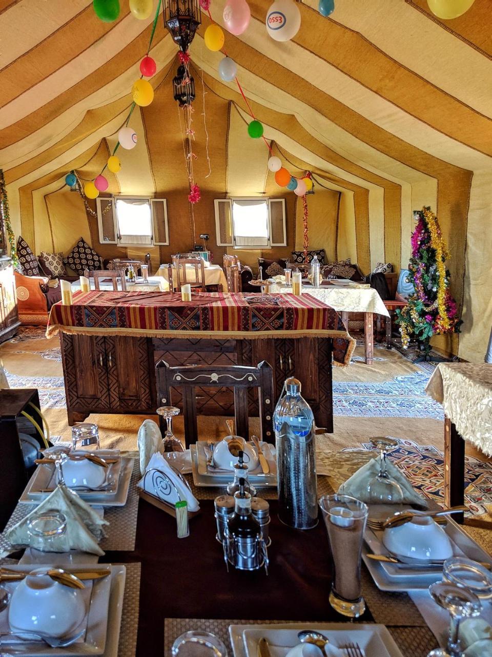 Sahara Majestic Luxury Camp Hotel Merzouga Exterior photo The interior of a Bedouin tent
